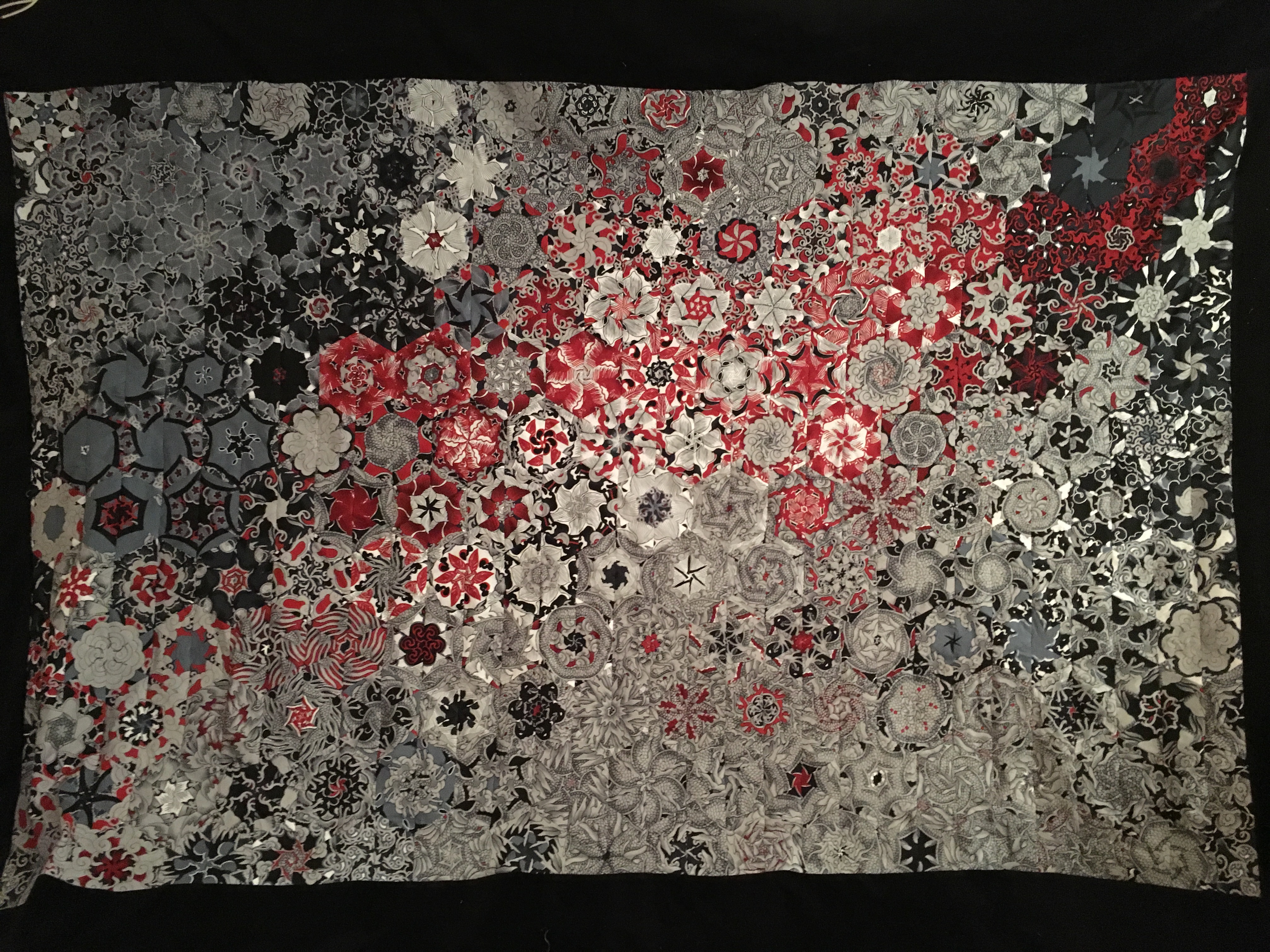 red and black hexie quilt