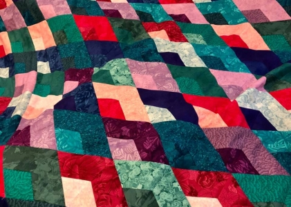 huge jewel tone boomerang quilt
