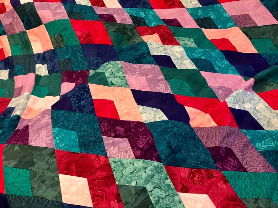 huge jewel tone boomerang quilt